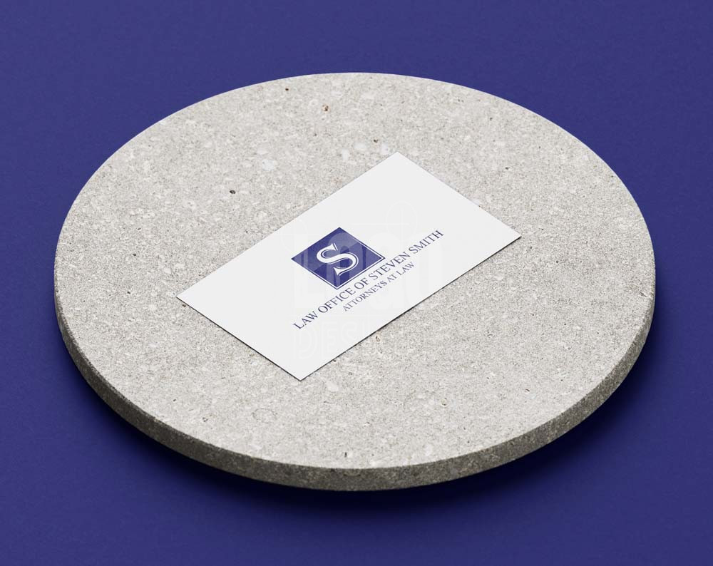 Logo design for law firm displayed on business card