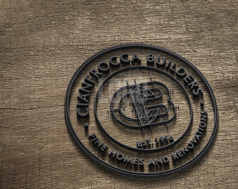 renovation logo design displayed on wood