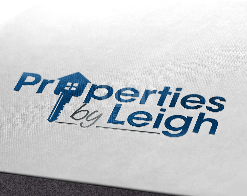 real estate logo design displayed on a piece of paper