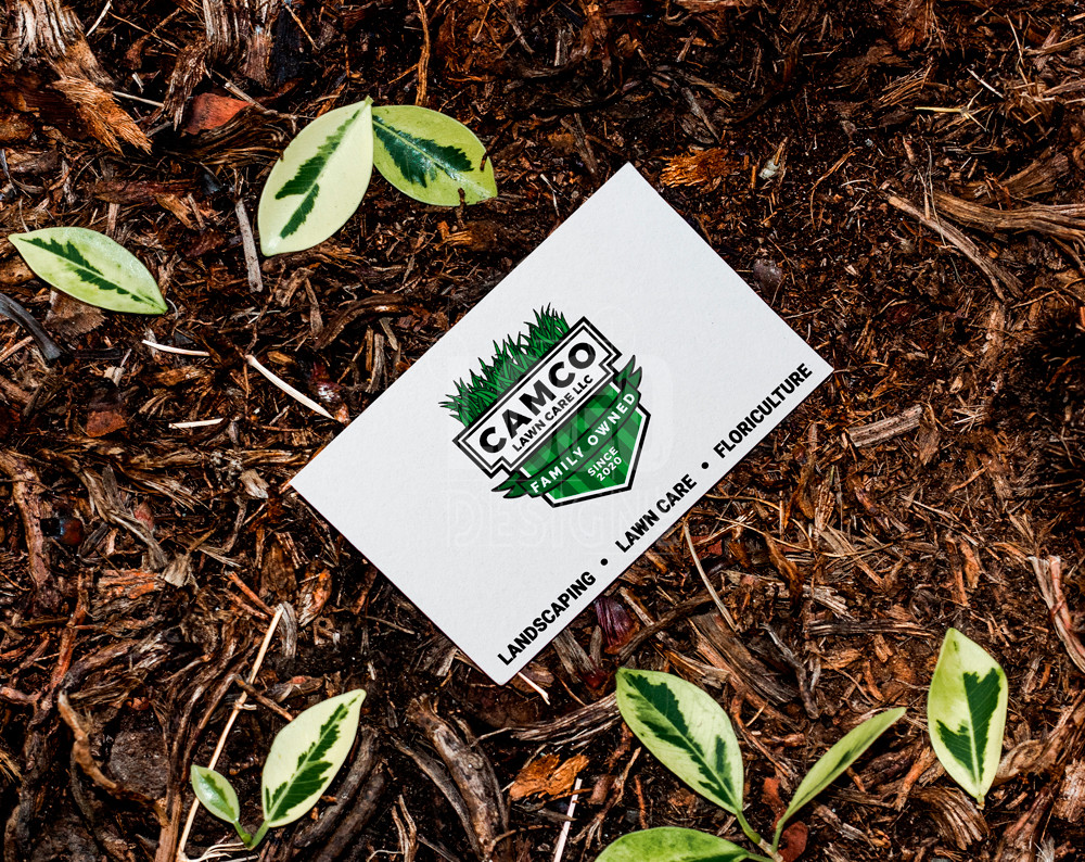 lawn care logo design displayed on a business card