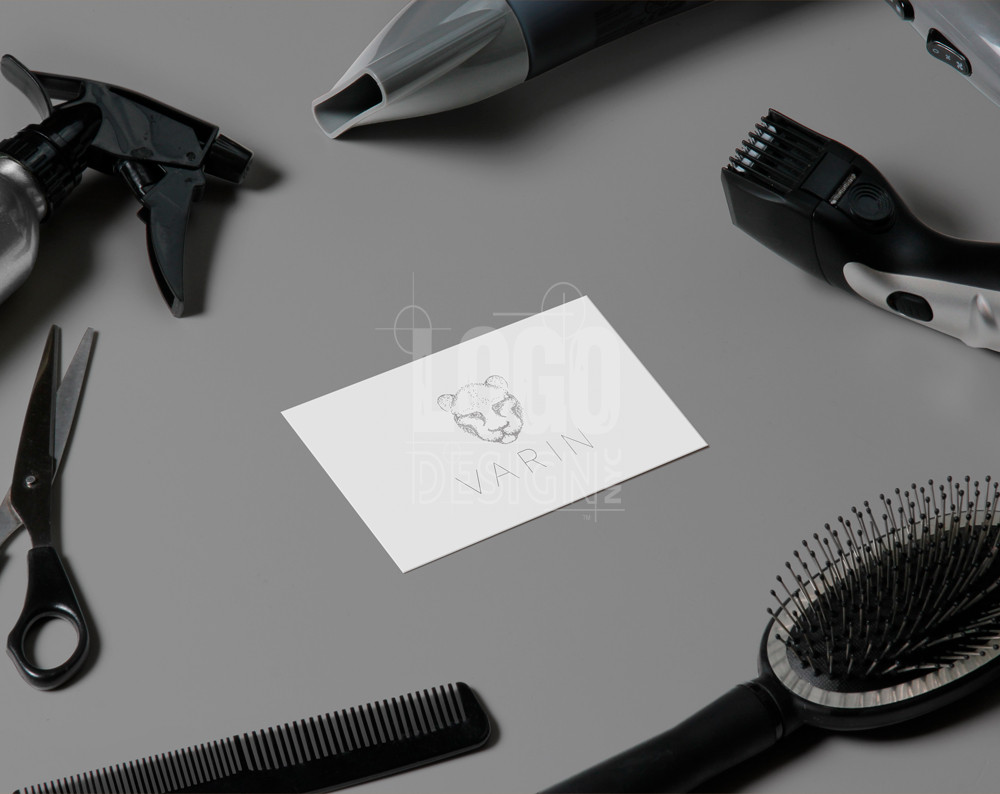 hair salon logo design displayed on a business card