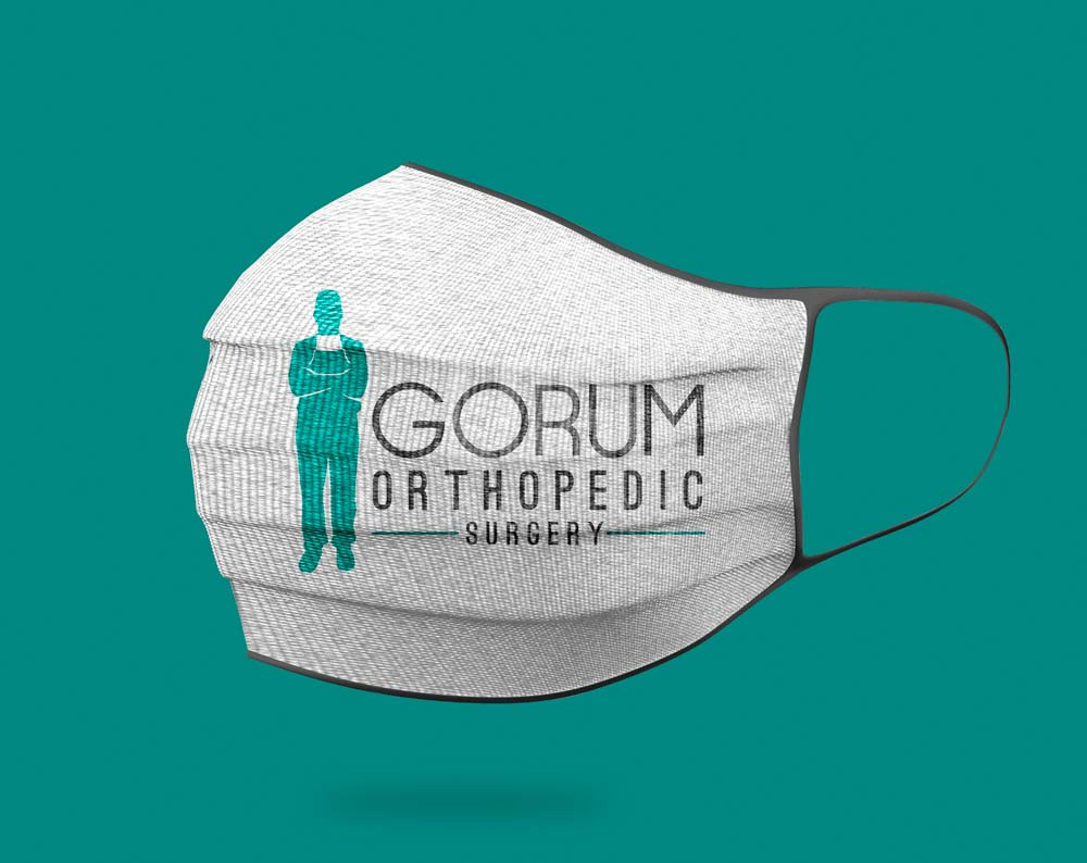 orthopedic surgeon logo design displayed on a mask