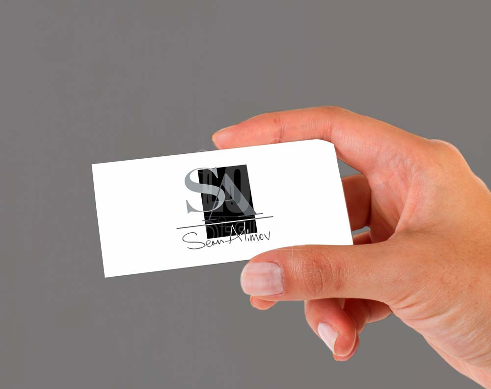 Logo design for fashion company displayed on business card