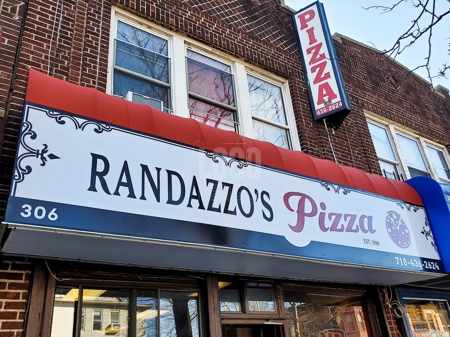 pizzeria branding displayed on sign