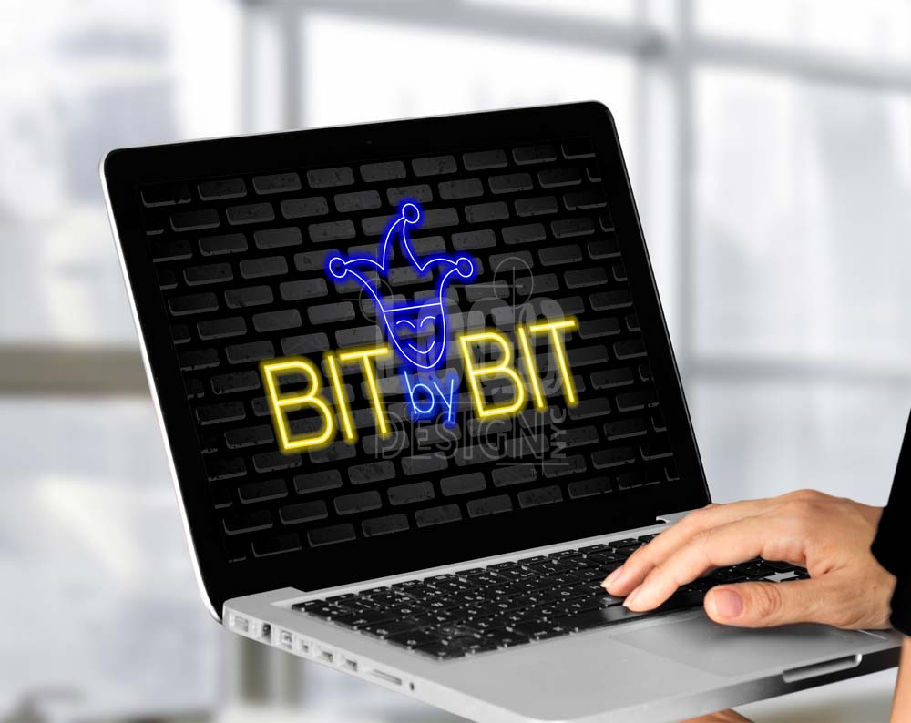 entertainment logo design displayed on a lap top computer screen