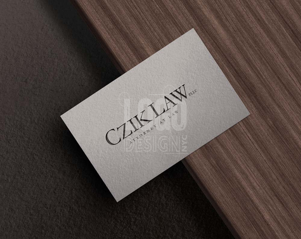 Logo design for law firm displayed on business card