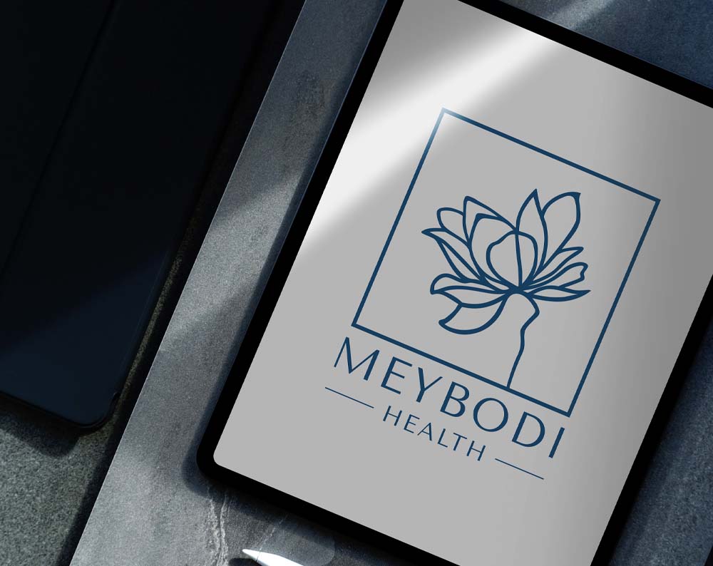 healthcare logo design displayed on a tablet screen