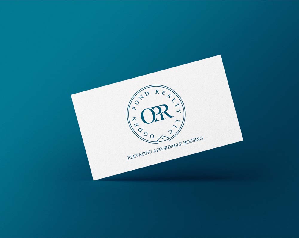 real estate logo design displayed on a business card