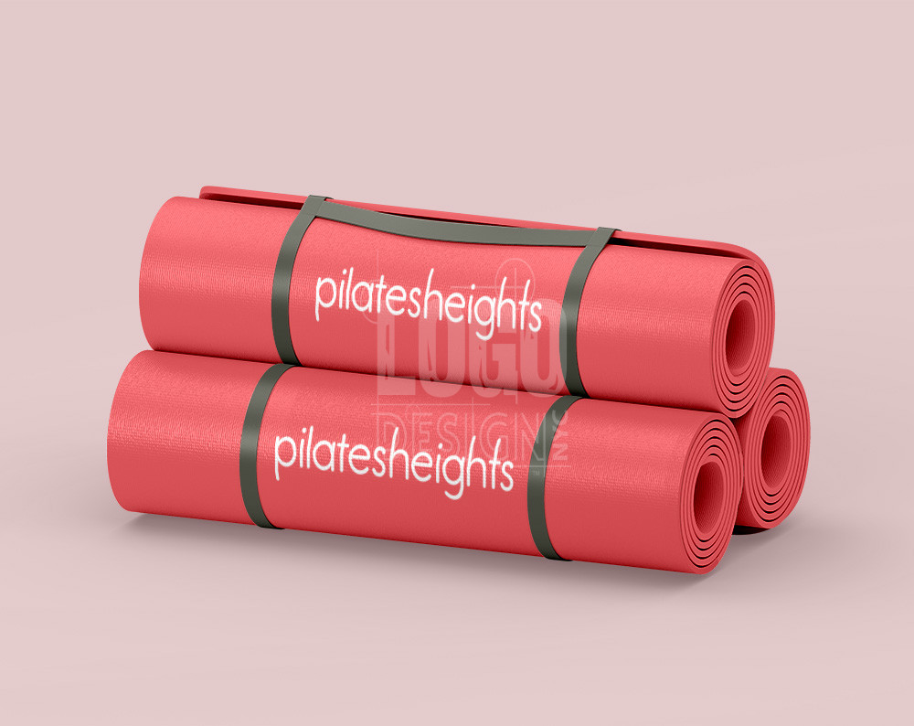 Pilates logo design displayed on work out mats