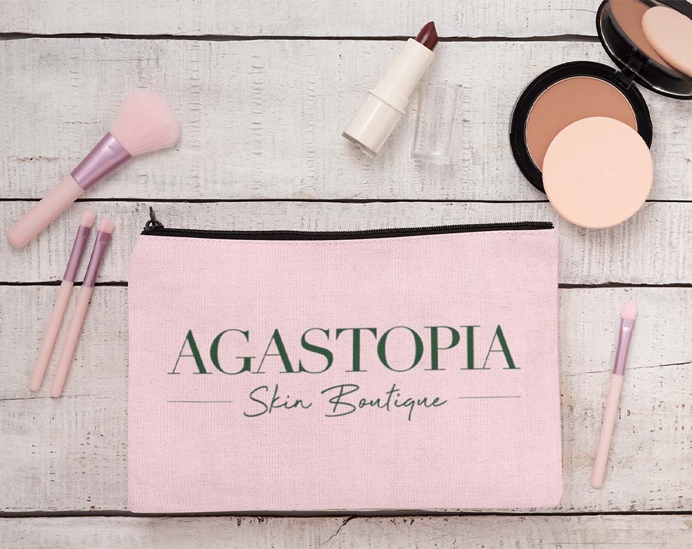 beauty shop logo design displayed on a make up bag