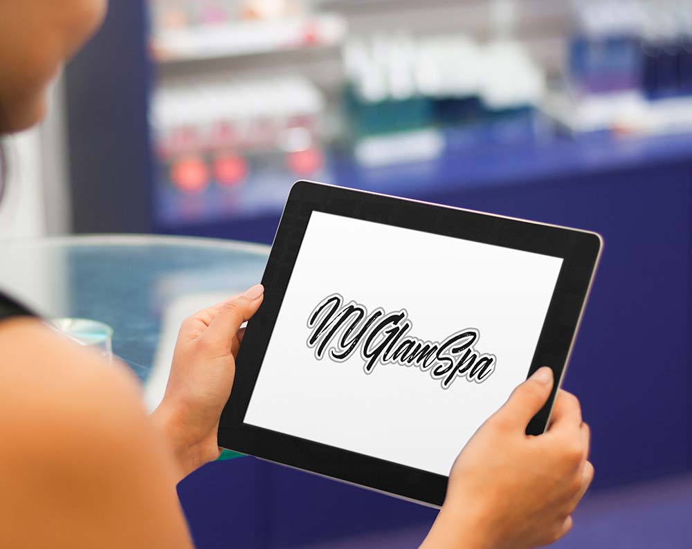beauty salon logo design displayed on a tablet screen