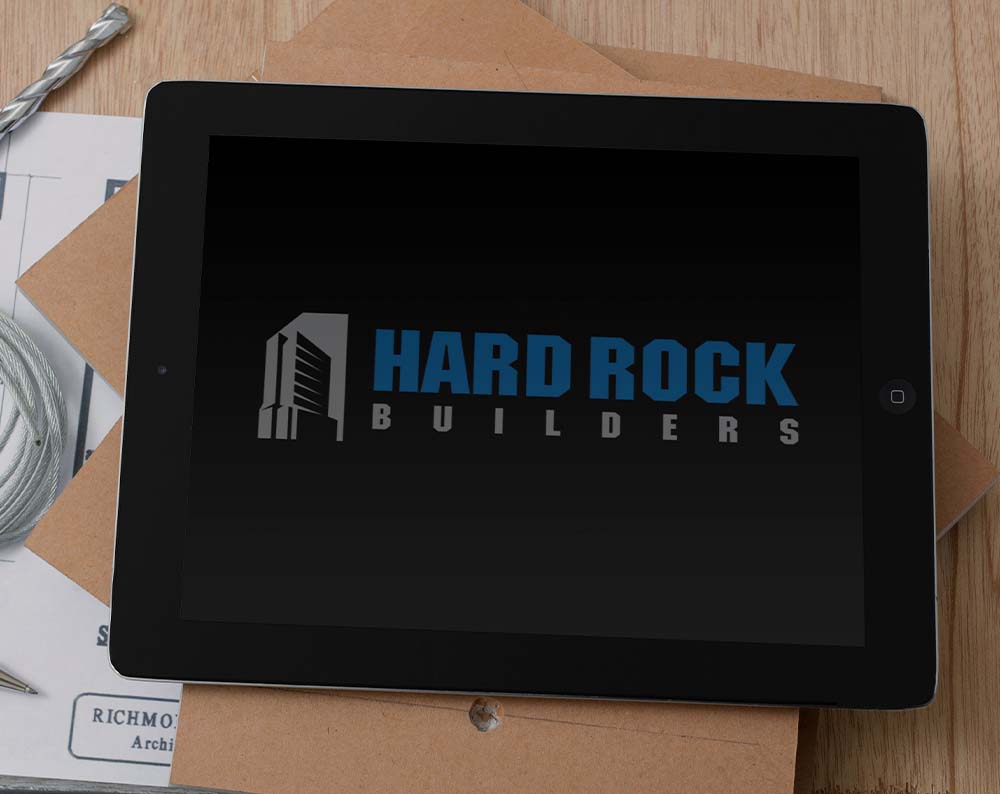 contractor logo design displayed on a tablet