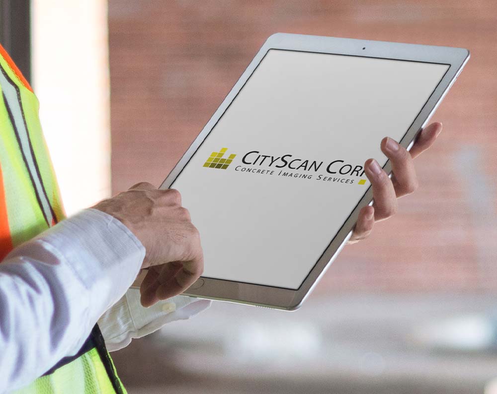 contractor logo design displayed on a tablet