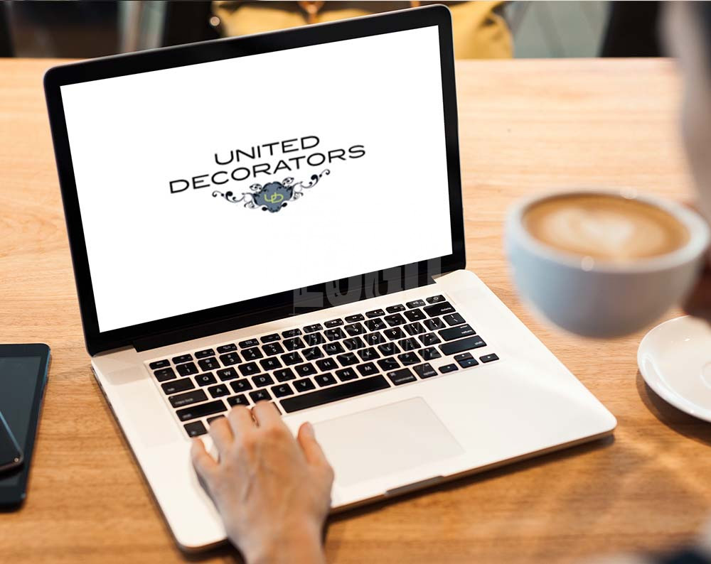 Decorator logo design displayed on a lap top