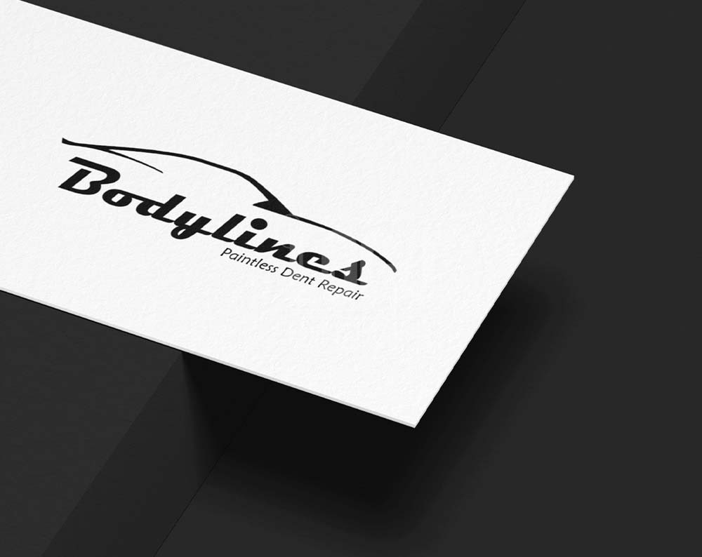 Auto repair logo design displayed on business card