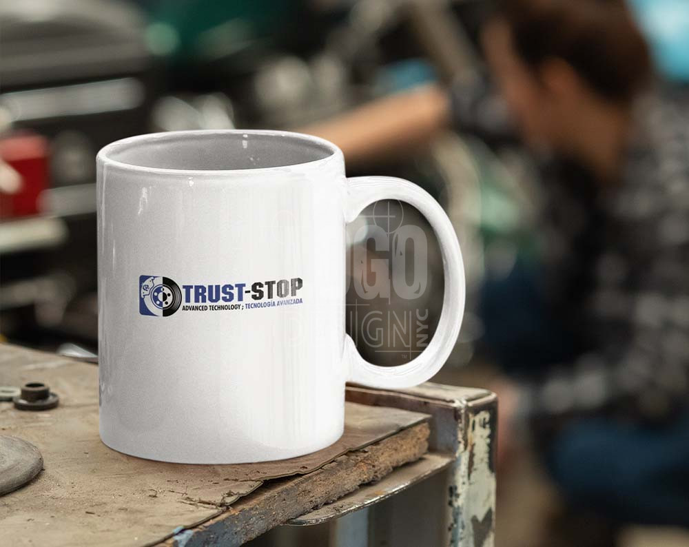 Contractor logo design displayed on a coffee cup