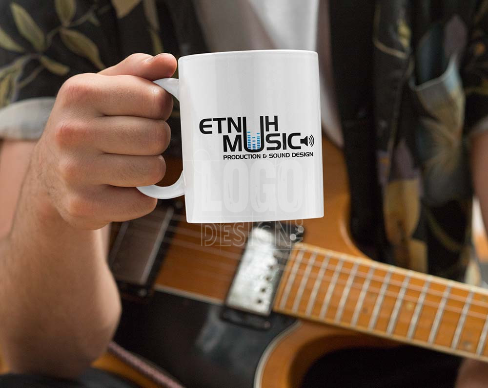 Music logo design displayed on coffee cup