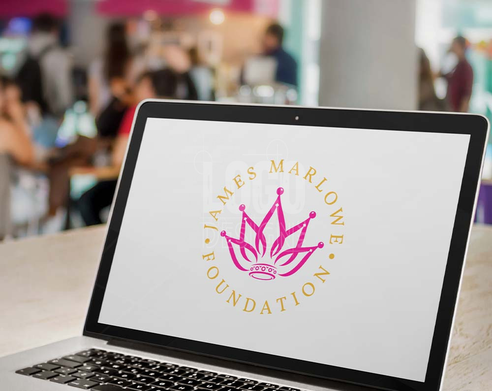 Non profit logo design displayed on lap top computer screen