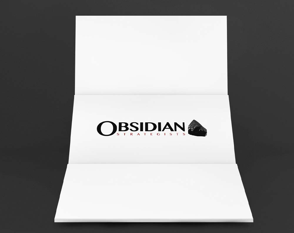 Non profit logo design displayed on a piece of paper