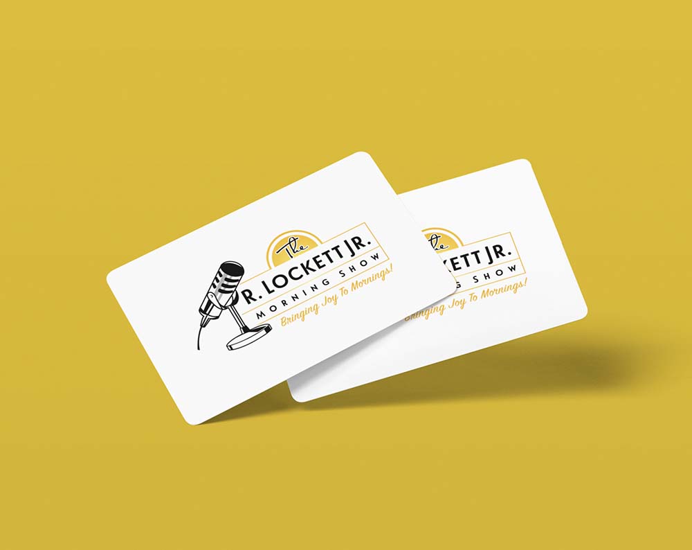 Entertainment logo design displayed on business cards