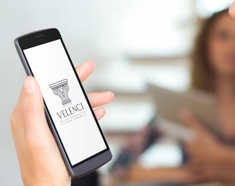 Fashion logo design displayed on a phone screen