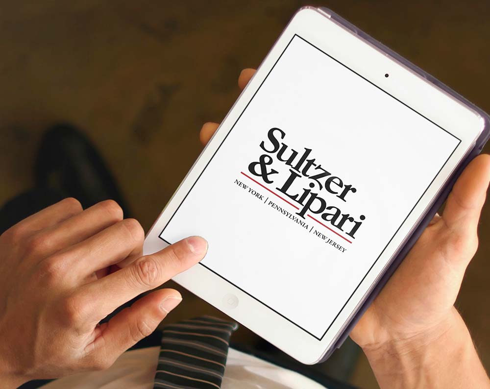 Law firm logo design displayed on a tablet screen