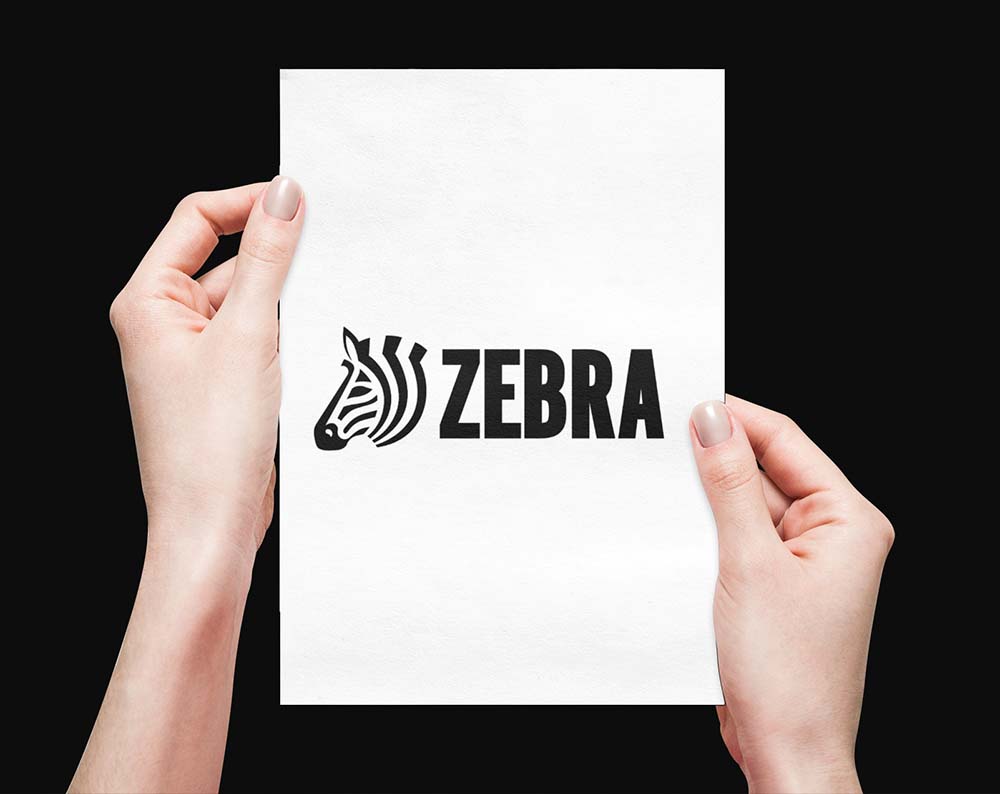 Tech logo design displayed on a piece of paper