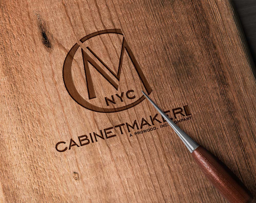 Contractor logo design displayed etched in wood
