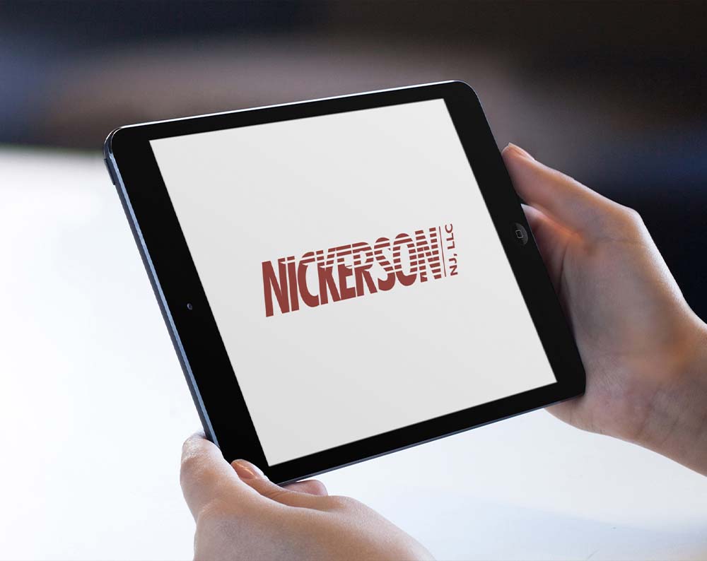 furniture logo design displayed on a tablet screen