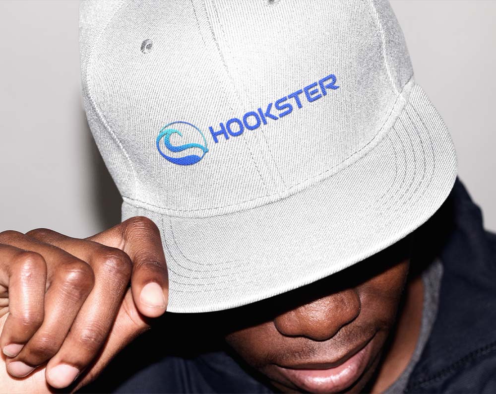logo for clothing company displayed on hat